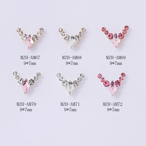 Pink V-shaped nail art charms with diamond rhinestones on gold and silver bases