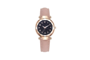 Detail view of starry sky dial with rose gold case and faceted glass cut on watch