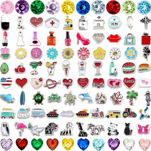 Detailed grid of colorful alloy charms with heart, animal, and floral designs for DIY jewelry