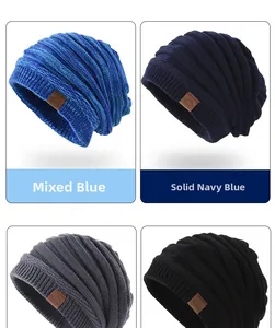 Detail view of four-color knit beanies with striped texture and Sport leather patch