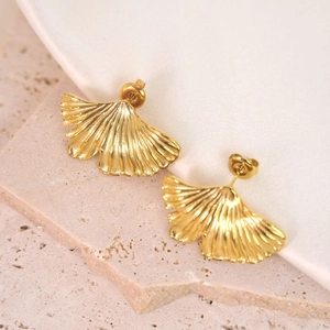 Elegant 14K gold plated irregular maple leaf stud earrings on a minimalist background