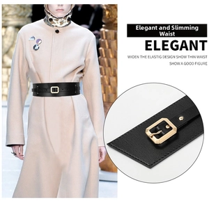 Detail of black PU corset belt with gold square buckle and elastic design for women