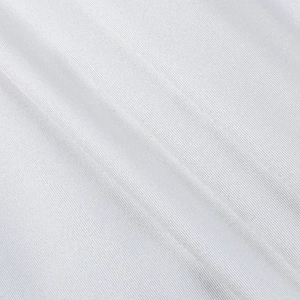 Macro detail of the white ribbed knit fabric texture on this sexy split bodycon dress