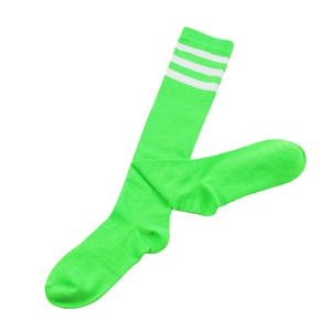 Flat lay of neon green knee-high socks with three white stripes and knitted texture