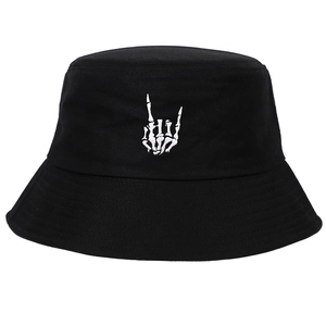 Black cotton bucket hat featuring white skeleton rock gesture embroidery and stitched brim