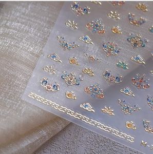 Detailed view of M-7 Chinese style nail stickers with golden embossed lotus patterns