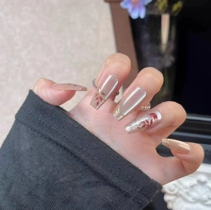 Lange trapezförmige Press-on-Nägel mit Champagner-Cat-Eye-Finish und Blattmustern