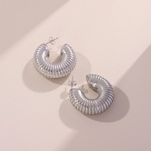 Chunky silver titanium steel hoop earrings with a trendy hollow croissant twisted design