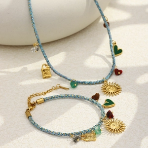 Parure de collier et bracelet bohème plaqué or 18 carats avec breloques cœur et soleil