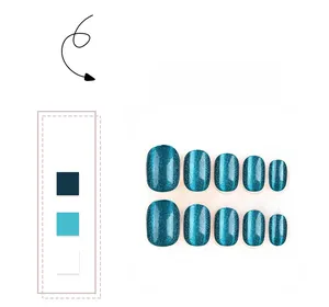 Detailed view of emerald green cat eye press-on nails with shimmering magnetic effect
