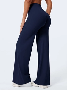 Vista posteriore dettagliata dei pantaloni da yoga a vita alta blu scuro a gamba larga
