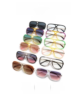 Close-up of retro aviator sunglasses array with colorful lenses and double bridge frames