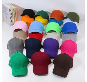 Multiple rows of colorful cotton baseball caps in a clean and organized display setup