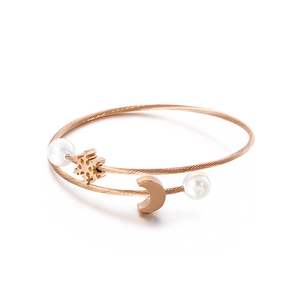 Rose gold double-strand twisted rope bracelet with pearl snowflake and moon charms
