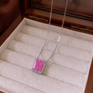 Elegant silver necklace featuring a rectangular pink zircon stone with a crystal halo