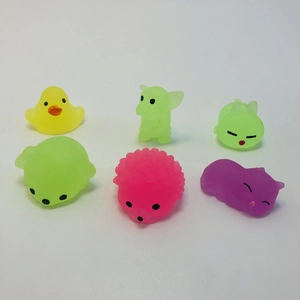 Set of 6 colorful animal mochi squishies made of soft TPR material on white background