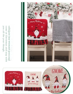 Detail of Christmas gnome chair covers featuring embroidery and red black plaid ruffles