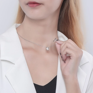 Minimalist S925 silver necklace featuring a square zircon pendant on a female model