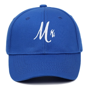 Close-up of premium white Mr embroidery on a classic dark blue cotton baseball cap
