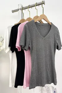 Detail of multi-color V-neck slim fit t-shirts in black, white, pink and grey knit fabric