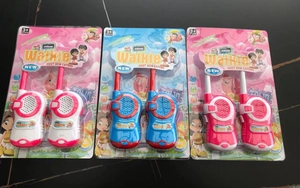 Three sets of kids' walkie talkies in retail blister packaging with color options