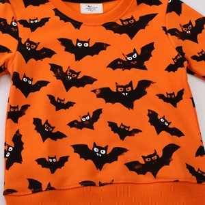 Kids orange Halloween sweatshirt with black bat pattern and soft crew neck finish