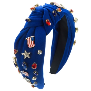 Patriotic knotted headband in dark blue with American flag charms and colorful rhinestones