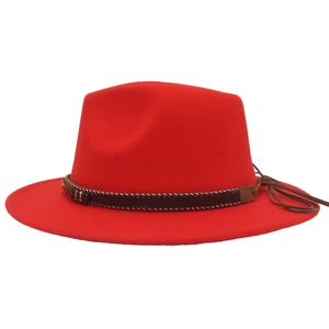 Detail of red wool jazz fedora featuring ethnic woven band and colorful bead accents