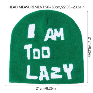 Close-up of green beanie showing dimensions 21x21cm and head size 56-60cm
