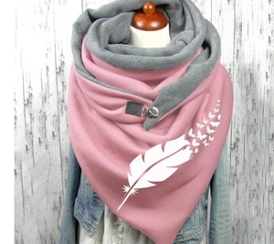 Detail of pink and gray hooded shawl with white feather patterns and buckle closure