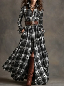 Detail of vintage plaid maxi dress with a brown leather belt and flared A-line hemline
