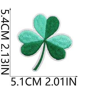 Detailed measurement of clover embroidery patch showing 5.4cm height and 5.1cm width