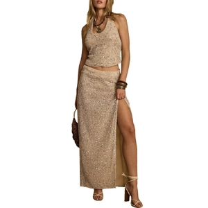 Set due pezzi in maglia con paillettes oro champagne con top allacciato al collo e gonna