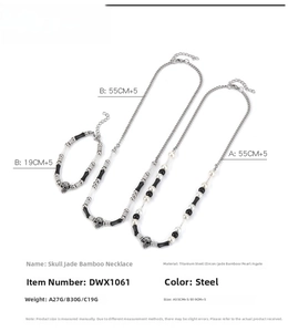 Detailed view of skull bead necklaces and bracelet with pearls and black jade bamboo elements