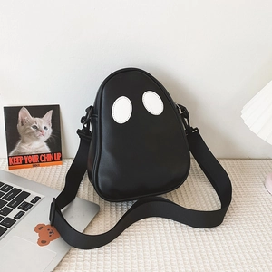 Close-up of the cute ghost-shaped PU leather crossbody bag with white eye patches