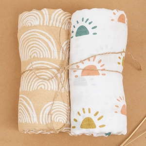Two-pack soft cotton muslin baby swaddle blankets with rainbow and sun prints