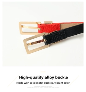 Close-up of golden square buckle and lychee textured leather thin belts in red and black