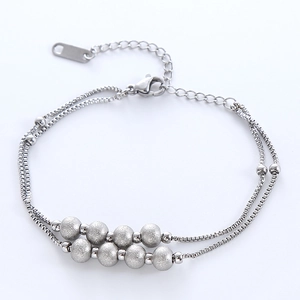 Double-layered stainless steel bracelet with frosted beads and adjustable lobster clasp