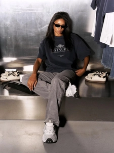 Fashionable dark grey 100% cotton t-shirt with white letter print and casual grey jeans
