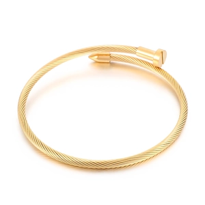 Gold stainless steel nail bangle featuring a twisted rope design and open end styling