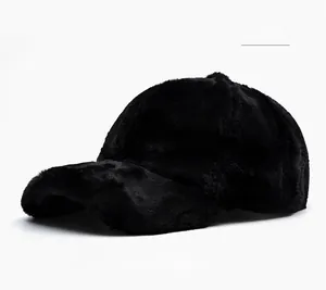 Close-up of the thick black faux fur texture on a six-panel winter baseball cap