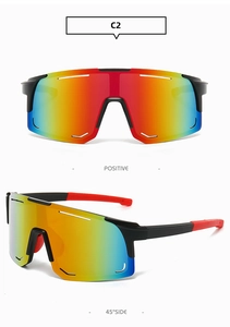 Detail view of sports cycling sunglasses with rainbow coating and black red frames