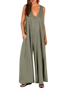 Detail of olive green sleeveless jumpsuit showing V-neckline and functional side pockets