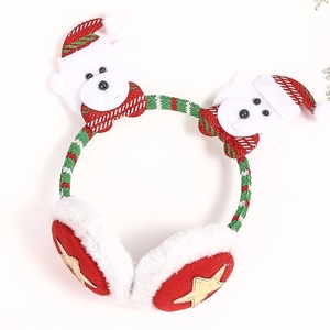 Detail of Christmas earmuffs with polar bear and stars on a plush knitted headband