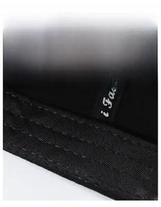Detail of breathable mesh fabric and moisture-wicking inner band of the baseball cap