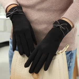 Women's warm black thermal touch screen gloves with a delicate bow on suede material