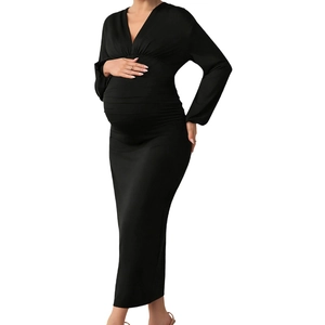Detail of elegant V-neck long sleeve maternity bodycon dress with side ruching design