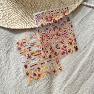 Artistic amber style nail art stickers MS114 and MS115 with warm geometric patterns