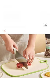 Double-sided kitchen cutting board with non-slip green edges for low noise food prep
