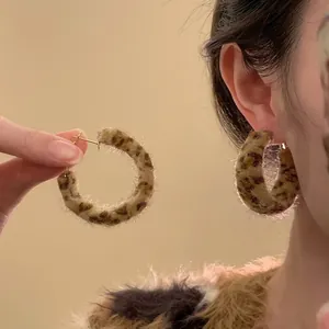 Vintage leopard print plush hoop earrings for women with brown faux fur texture